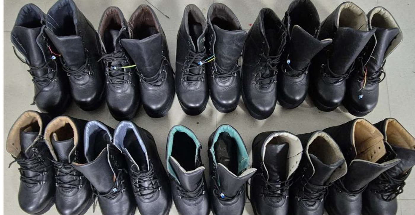 Power-harvesting army boots — laser-textured TENG — An army boot that generates its own electricity from walking. A triboelectric nanogenerator in the sole is laser-textured at 355 nm to raise its output, then rectified and stored to run GPS and RFID for locating and identifying soldiers — with no battery to change. Ten pairs were built and delivered to ARDE, Pune.